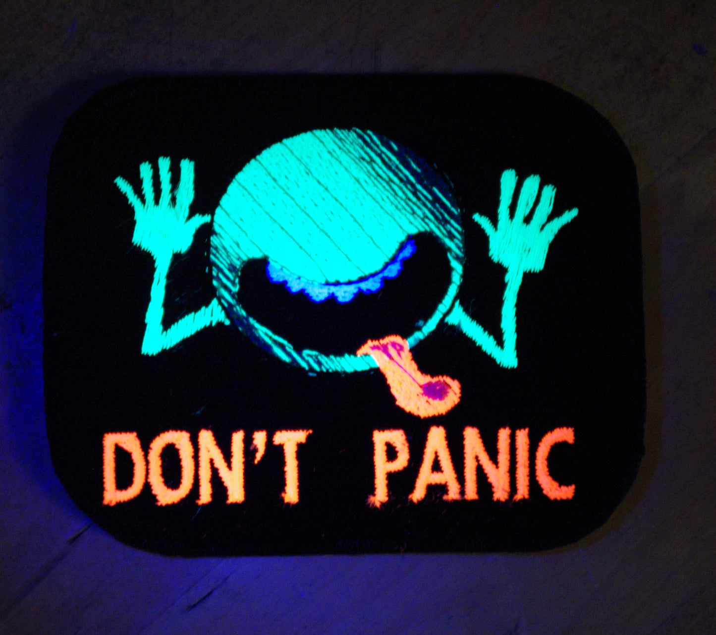 Don't Panic UV reactive iron-on patch