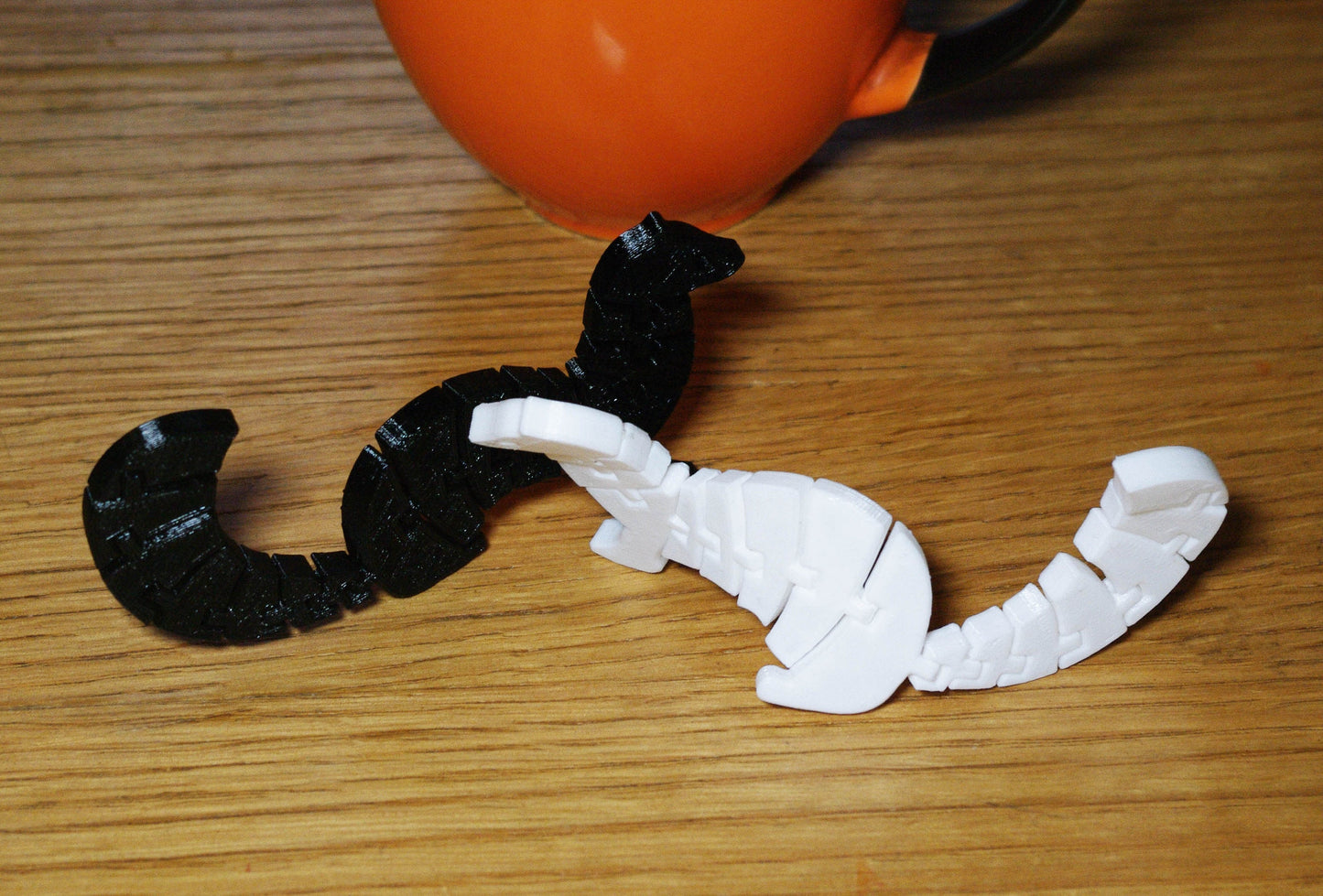 Flexible Weasel 3d printed toy. Multiple colours available. Quick dispatch. Free UK delivery.